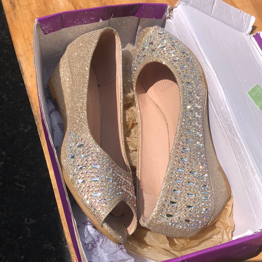 Bedazzled wedge heel.